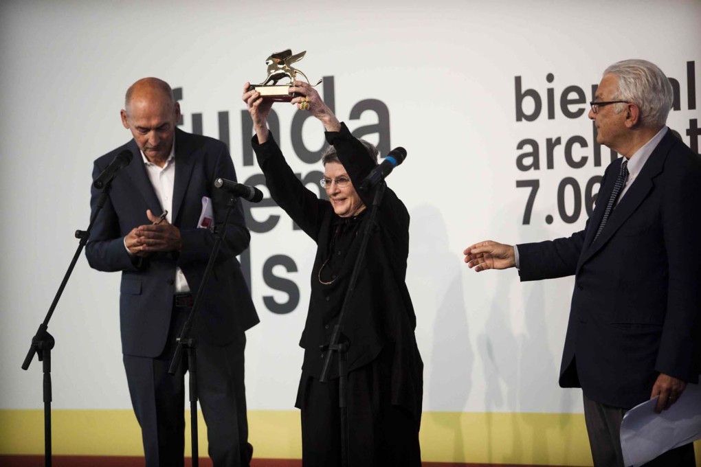 Phyllis Lambert receiving the Golden Lion for Lifetime Achievement at the 2014 Venice Biennale, from Rem Koolhaas (left) and Paolo Baratta (right). (Photo &copy;&nbsp;Italo Rondinella, 2014; Courtesy: la Biennale di Venezia)