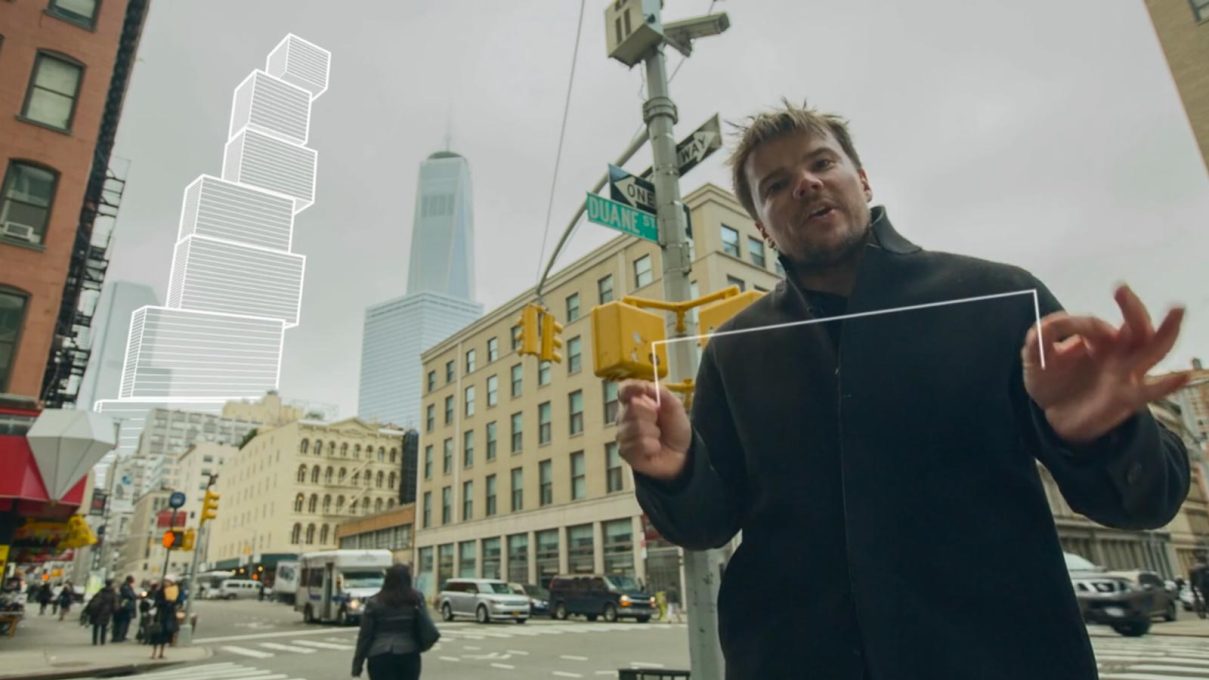 Still from 2 World Trade Centre tower promo by BIG, with Bjarke Ingels &ldquo;like a magician ...conjuring animated diagrams out of thin air...&rdquo; &ndash; here a &ldquo;vertical village&rdquo; over grey, gritty Tribeca. (Video: BIG, Squint/Opera)&a