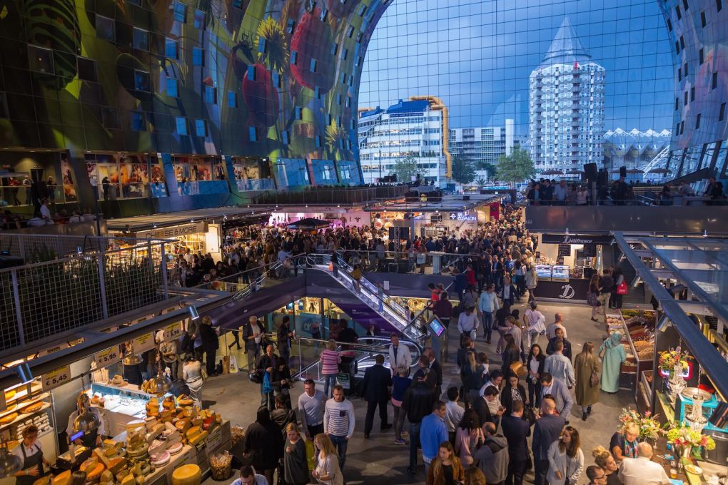 The multi-tiered Markthal interior provides a new public space for the city into the evening. (Photo&nbsp;&copy; Steven Scholten, courtesy of MVRDV)