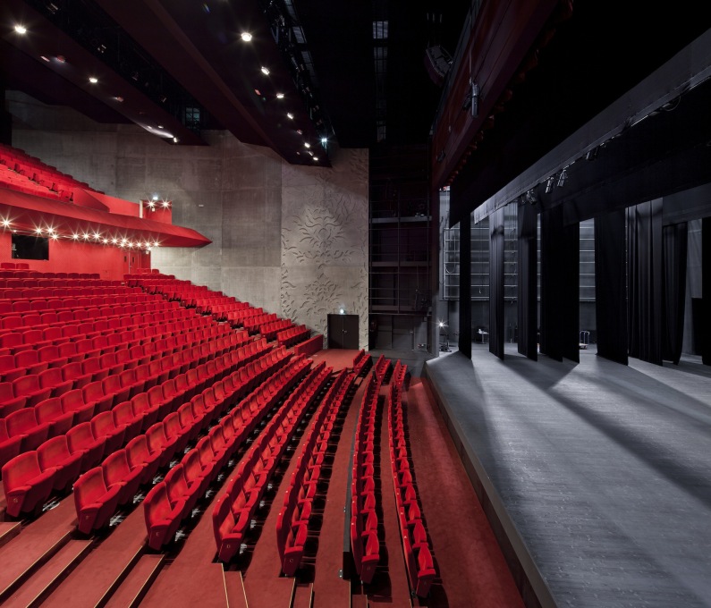 The vividly colored auditorium and seats. (Photo: Luc Boegly)