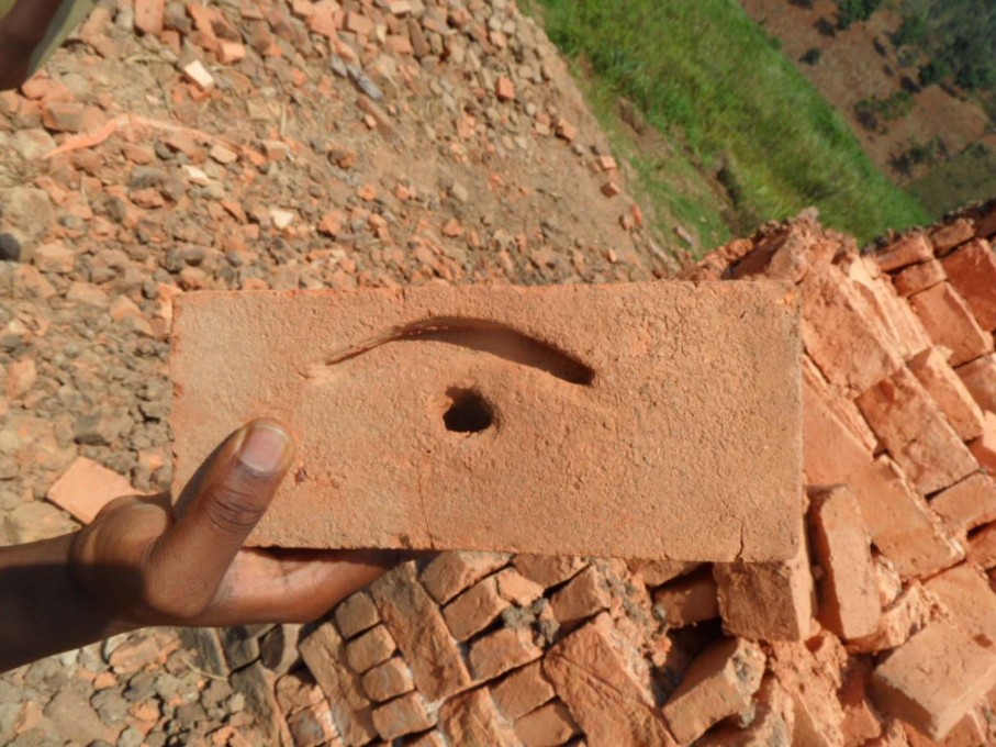 One of the bricks made on site, dried and ready for use. (Photo courtesy Yves Alain Twizeyimana)