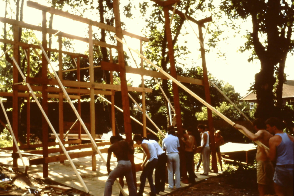 Frame-raising as a communal activity. c1970s. (Photo courtesy Jon Broome)