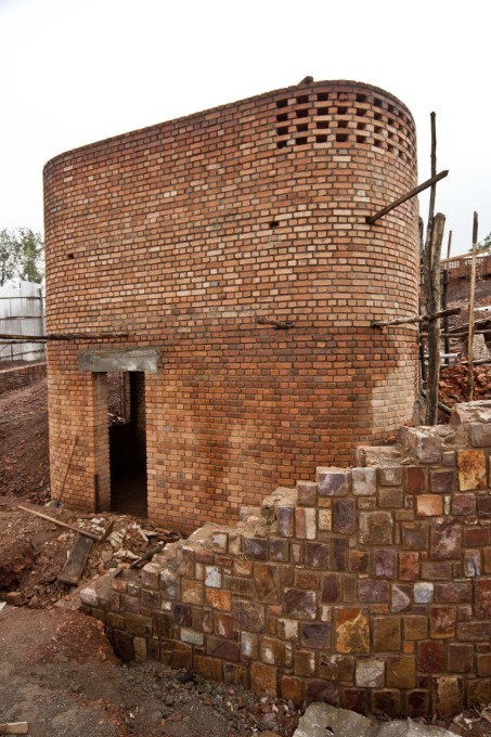 A brick core&nbsp;under construction of one of the 17 pavilions that make up the Center. (Photo courtesy Sharon Davis Design)