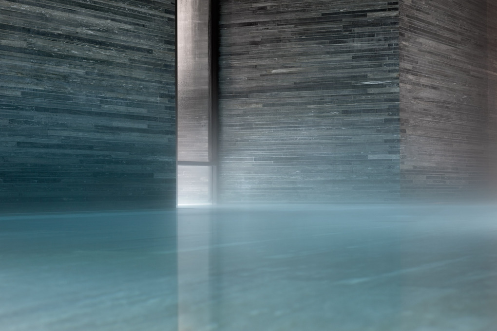 The whole structure is faced in the textured blue-grey stone of Valser Quartzite. (Courtesy Hotel Therme Vals)