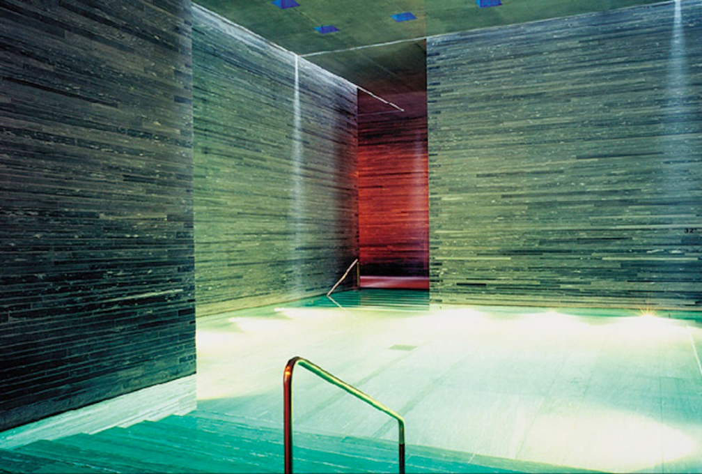Looking through to the red glow of the fire pool. (Photo courtesy www.archdaily.com)