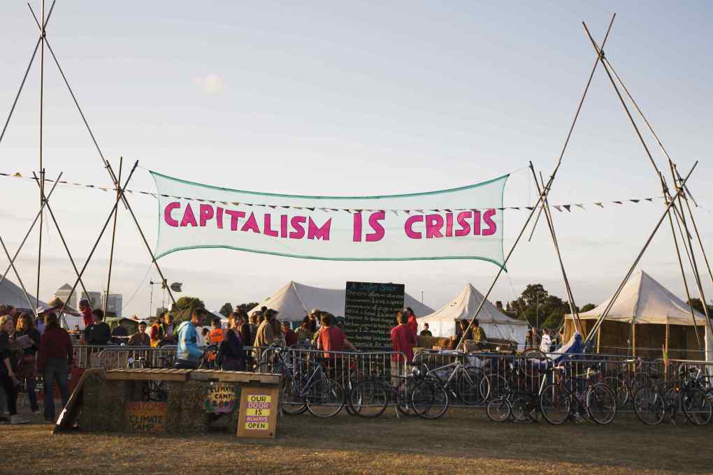 &ldquo;Capitalism is Crisis&rdquo; banner at the Occupy London Stock Exchange: non-violent protests against economic inequality. (Photo &copy; Immo Klink)