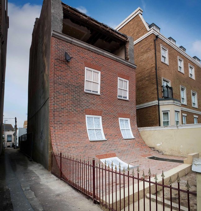 Alex Chinneck interweaves reality and fiction, creating a playful illusion with his surreal installations.