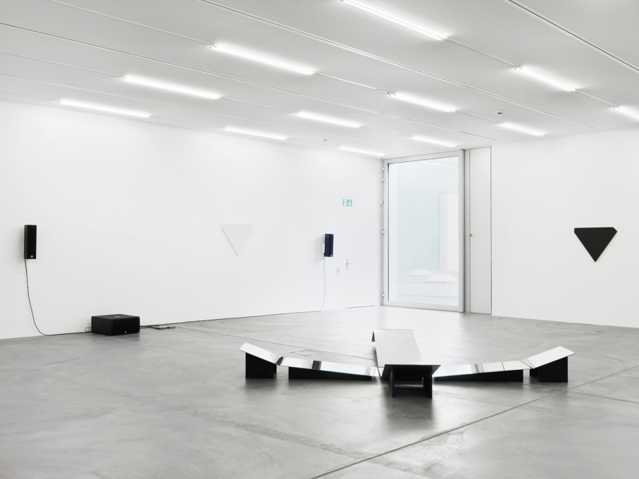 Upstairs Trix and Robert Haussmann&rsquo;s &ldquo;Liegende Figur, homage &agrave; Bracelli&rdquo;, (2014), an installation of flat and tilted mirrors in the centre of the space.