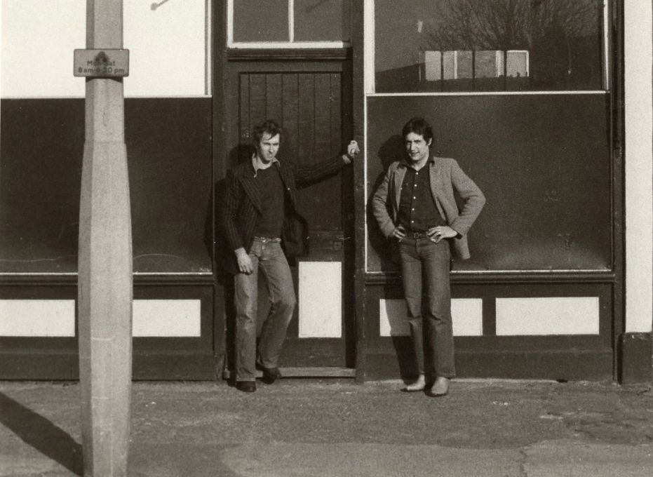 Jonathan Harvey and David Panton outside 117 Devons Road, E3 in 1974, one of the first two Acme houses to be renovated and the organisation&rsquo;s first office. (Photo: Claire Smith, courtesy Whitechapel Gallery)