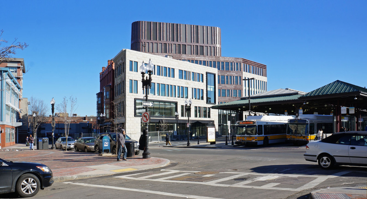 The Bolling Municipal Center opens up, with ground floor retail spaces, to the Dudley Square bus terminal, pictured here.