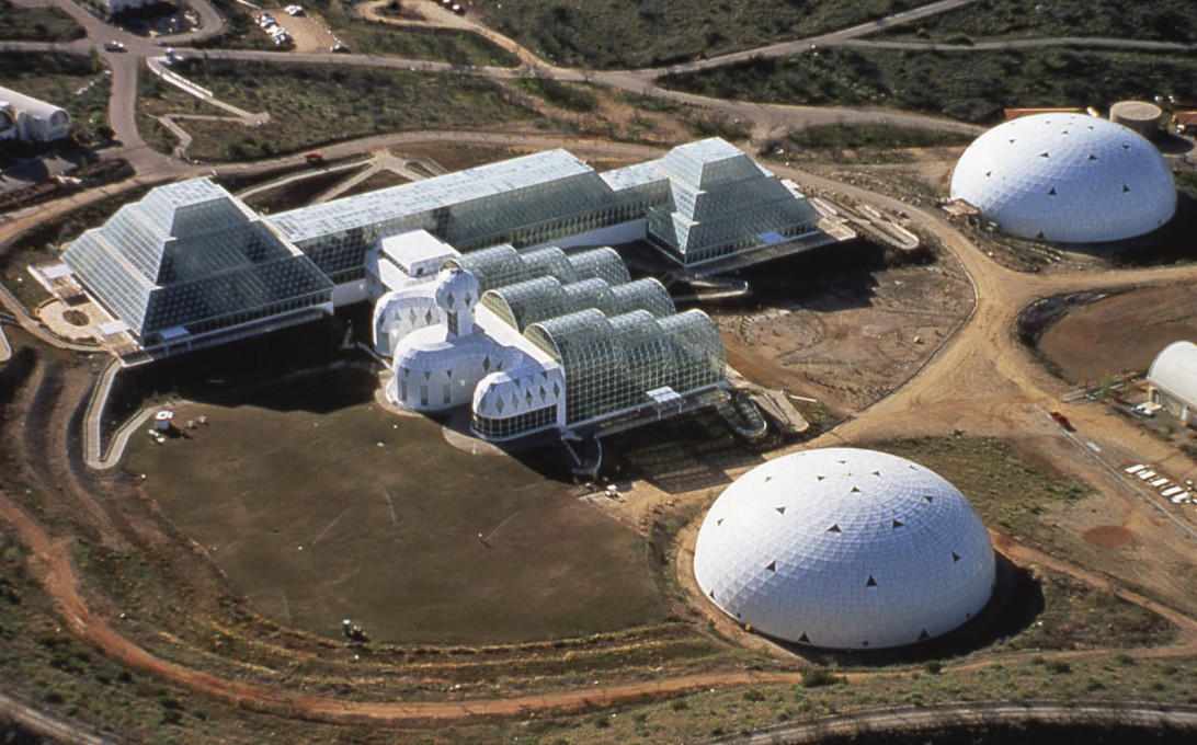 Biosphere 2 (1991), Arizona. The Wilderness Biome is shown on the upper left side, Habitat and the Agricultural Biome are in the centre and the lung domes on the right. (Courtesy Peter Jon Pearce)