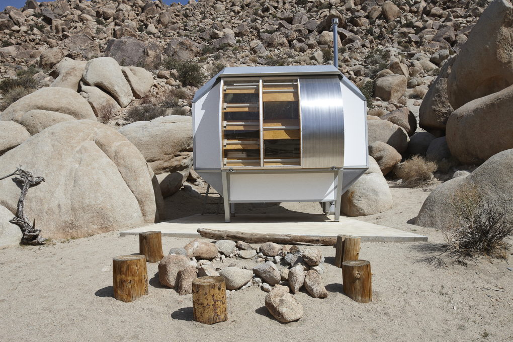 ...It includes individual bedroom pods called 'Wagon Stations', communal kitchen, open-air showers composting toilets