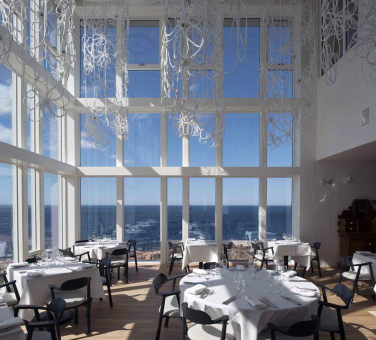Fogo Island Inn dining room, view north-west out to the North Atlantic. (Photo: Alex Fradkin)