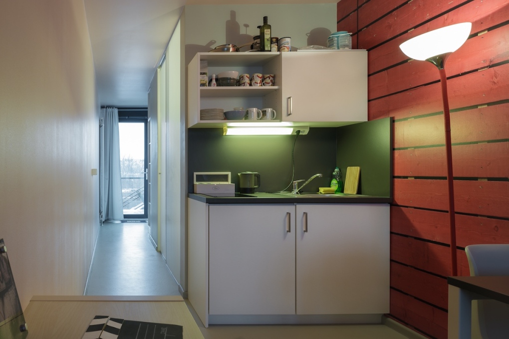 Both the bathroom and the kitchen of each container is located to one side in middle of the space allowing, in the case of the single container units, the maximum amount of light possible the enter.