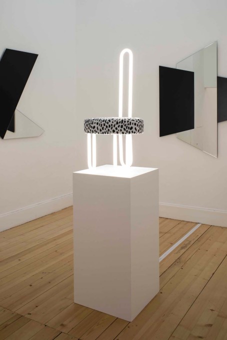 ...is displayed in the final room in the exhibition, its faux dalmatian skin seat and neon-tube back placed high on a plinth. (Photo: Primula Bosshard)