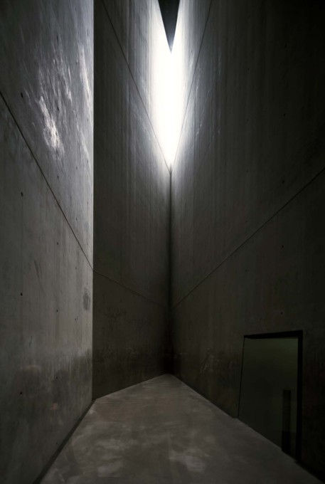 A view inside the Holocaust Tower, an unheated, empty concrete void which reaches a height of 24 metres and which is lit by a single slit at the top of the structure.&nbsp;(Photo &copy;&nbsp;BitterBredt Photography)