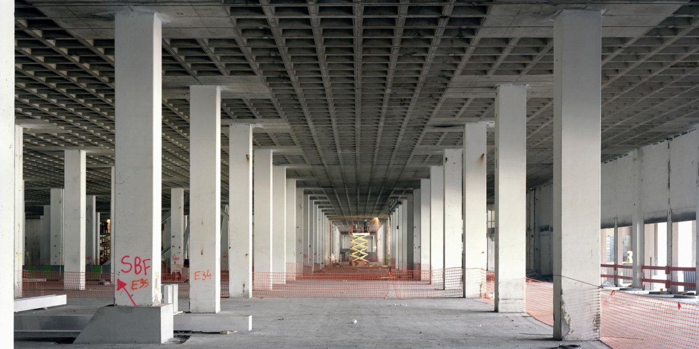 From the start its massive structure of concrete columns and beams was designed to be able to support a further four to five storeys above. (Photo: Cyrille Weiner)