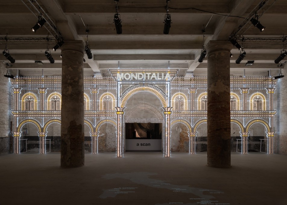 The entrance to &ldquo;Monditalia&rdquo; in the Cordiere. Roll up! Roll up! It&rsquo;s showtime! Luminaire structure designed by OMA with Swarovski. (Photo: Gilbert McCarragher)