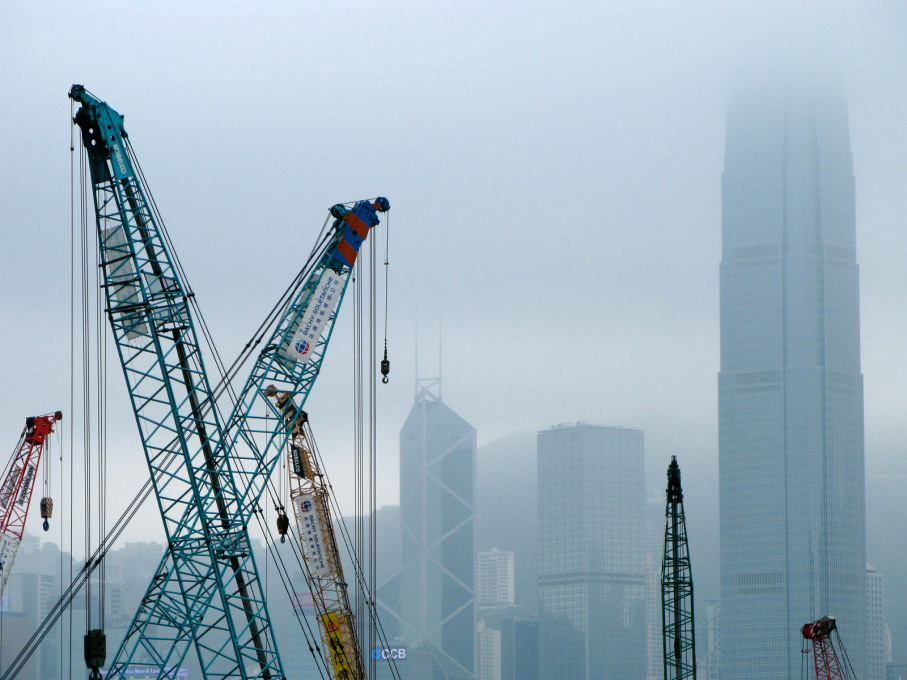 The M+ construction site with Hong Kong&rsquo;s skyscrapers across the harbour.