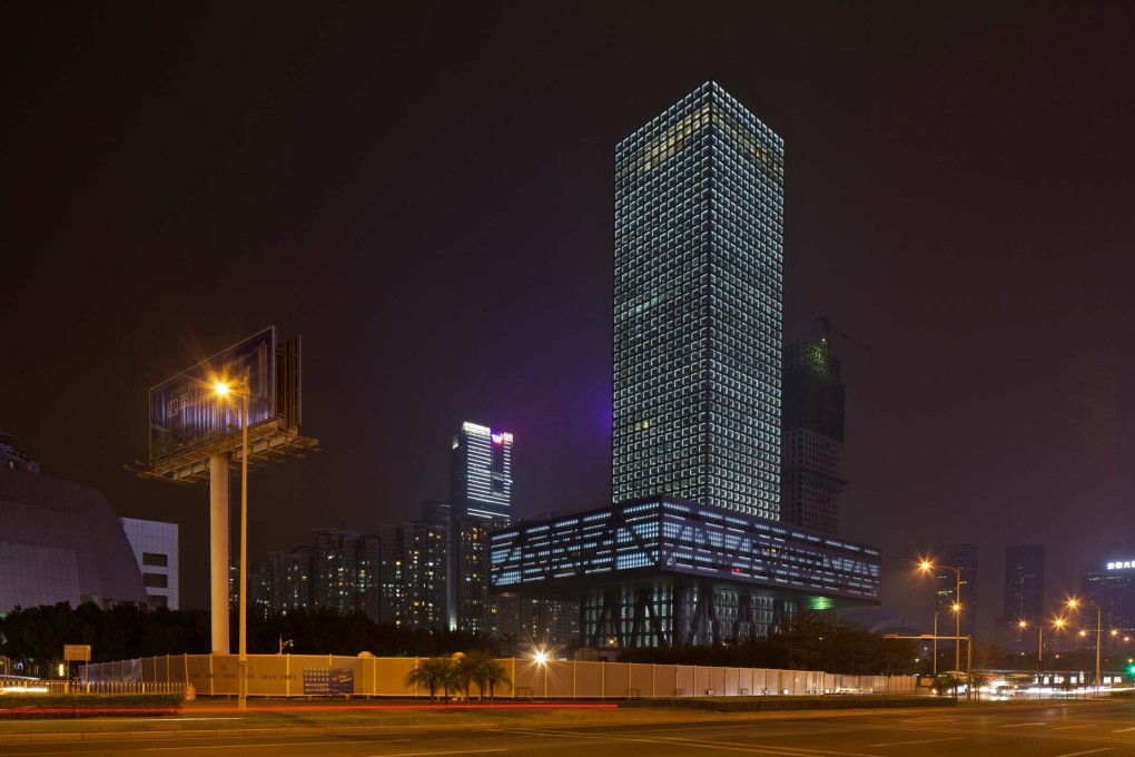 Shenzhen Stock Exchange at night. While proudly defying gravity, it still complies with traditional rules of cosmic harmony: a perfect symbol for the new China. (Photo:&nbsp;Philippe Ruault, courtesy OMA)