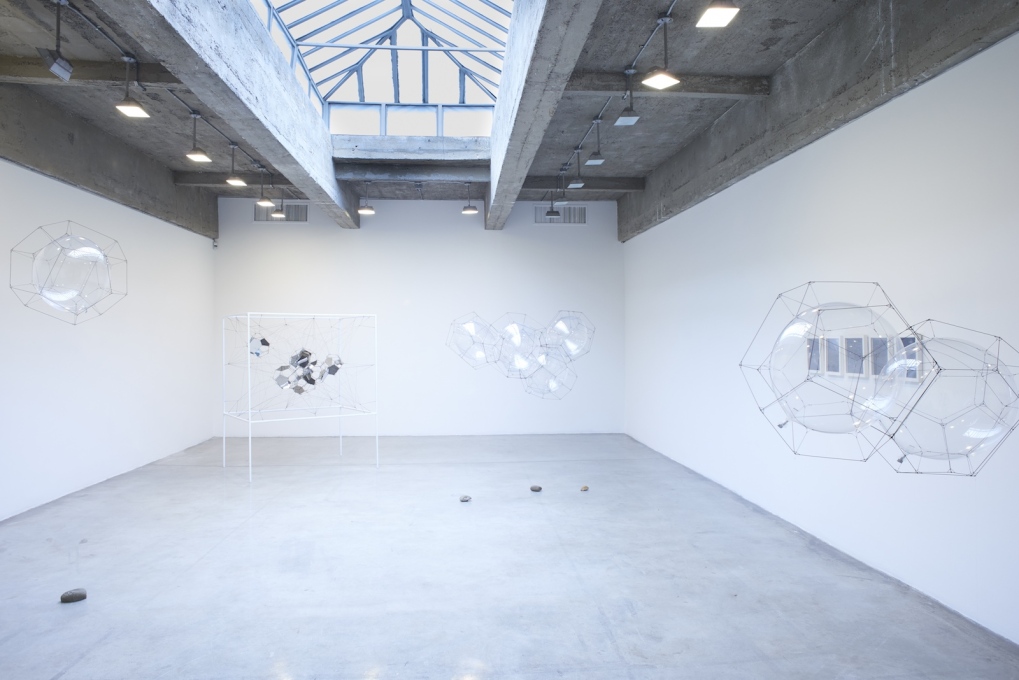 Installation view of earlier work by Saraceno is on view in Gallery 2.