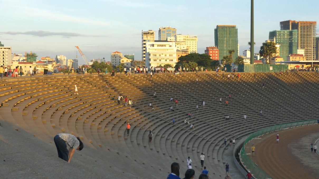 The stadium provides a valuable quiet public space for couples to meet, rare in the city. Film still from the forthcoming documentary &ldquo;The Man Who Built Cambodia&rdquo; (&copy; Balrom Films)