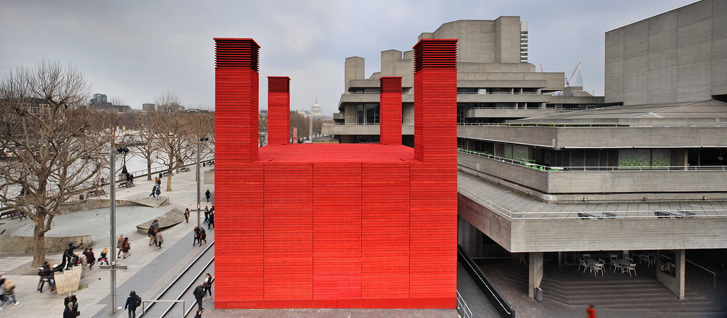 The red shed creates a huge contrast with its concrete surroundings. (Photo &copy;&nbsp;Philip Vile)