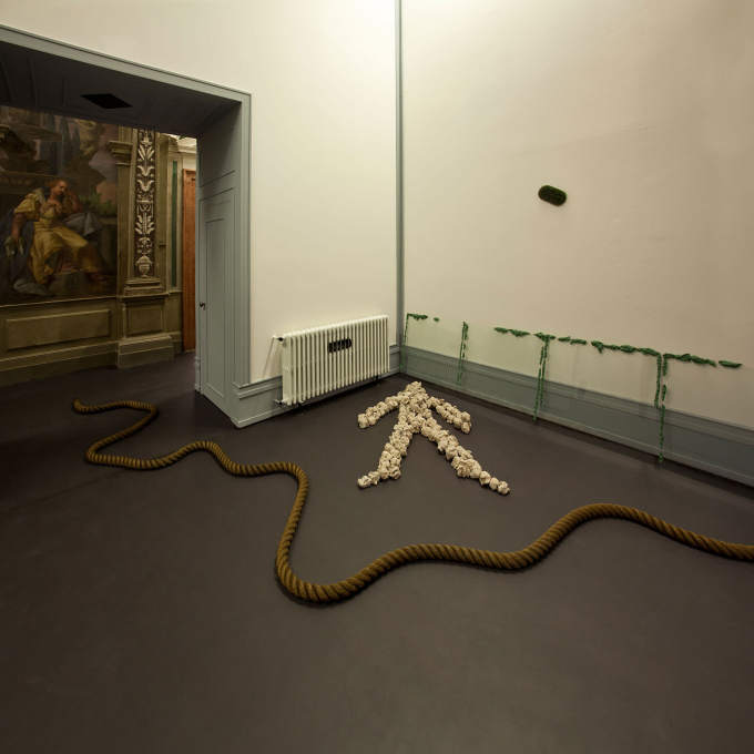 Barry Flanagan's "Two Space Rope Sculpture" connects two very different spaces at Fondazione Prada than it did in Kunsthalle Bern.