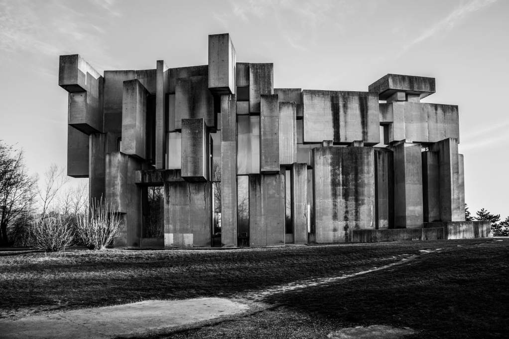The looseness of the composition of traditionally urban concrete materiality allows the church to seem at home within its more rustic surroundings. (Photo: Anton Bauder)