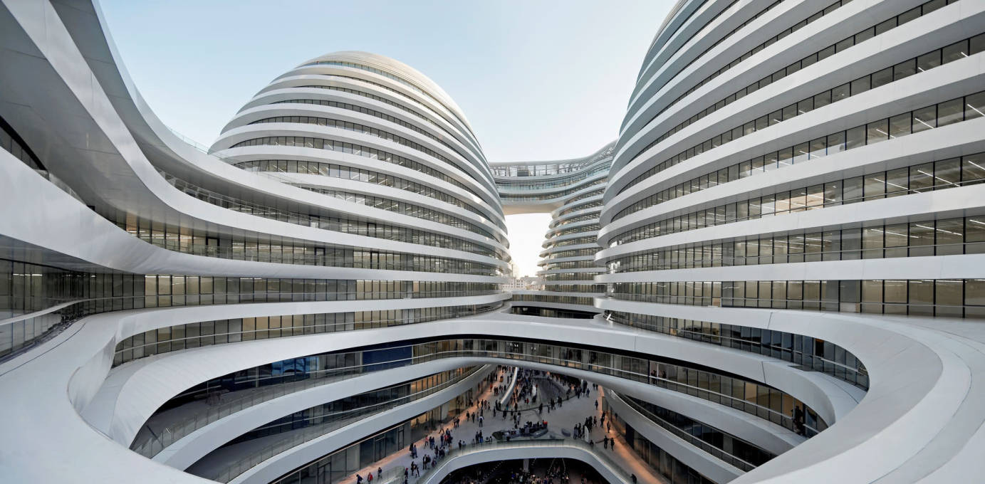 &ldquo;...the project&rsquo;s central public space, an outdoor retail mall in the &ldquo;valley&rdquo; between the four towers. Hadid describes it as a gesture to traditional Chinese courtyard buildings...&rdquo;&nbsp; (Photo: Hufton + Crow)