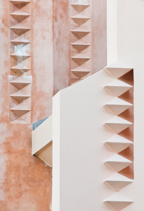 Detail of diamond and triangle patterning to the decorative elements of the gable roof and chimney, showing clearly the influence of Frank Lloyd Wright. (Photo: Brett Winstone)
