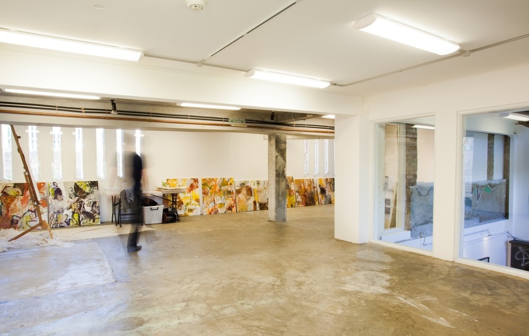 Inside the artist-in-residence studio, showing its internal windows which look into the double height void above the gallery space below. (Photo: Brett Winstone)