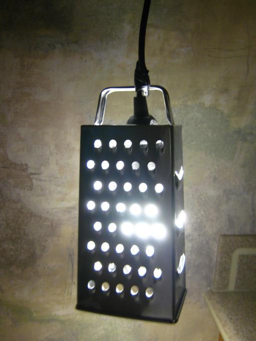 An IDEALISK cheese grater transformed into a lamp in under ten minutes, by hacker K McF. (Courtesy IKEAhackers)