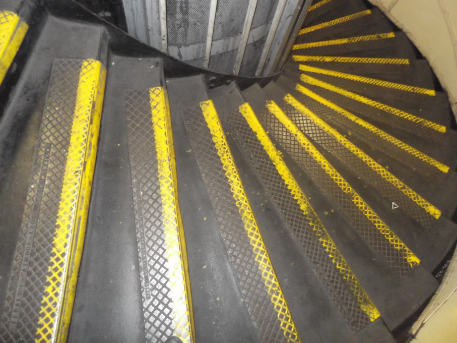 The tread of the spiral-stair at Elephant and Castle is worn - the steps are used regularly by commuters, though the climb up is 123 steps! (Photo: Flickr user thermostinept)