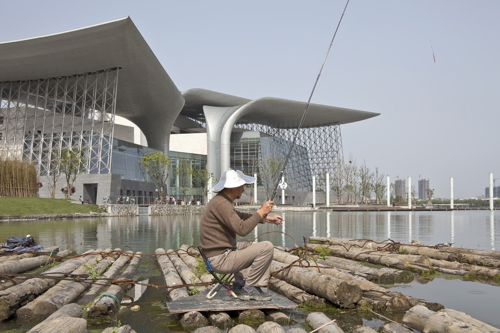 Wuxi&prime;s new cultural landmark, the Grand Theater, hovers on the edge of Taihu Lake - it also hovers on the edge of integration with local culture.&nbsp;(Photo: Kari Palsila &copy; PES-Architects)