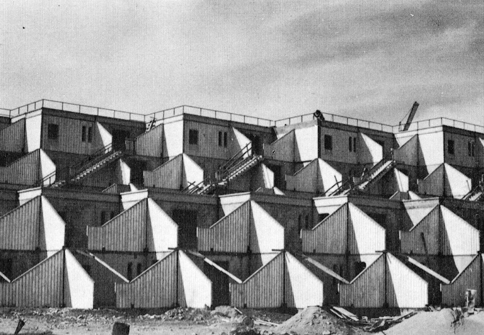 The housing complex rejected the arched windows and introspective typologies of Old Jerusalem... (Image courtesy Arieh Sharon office)