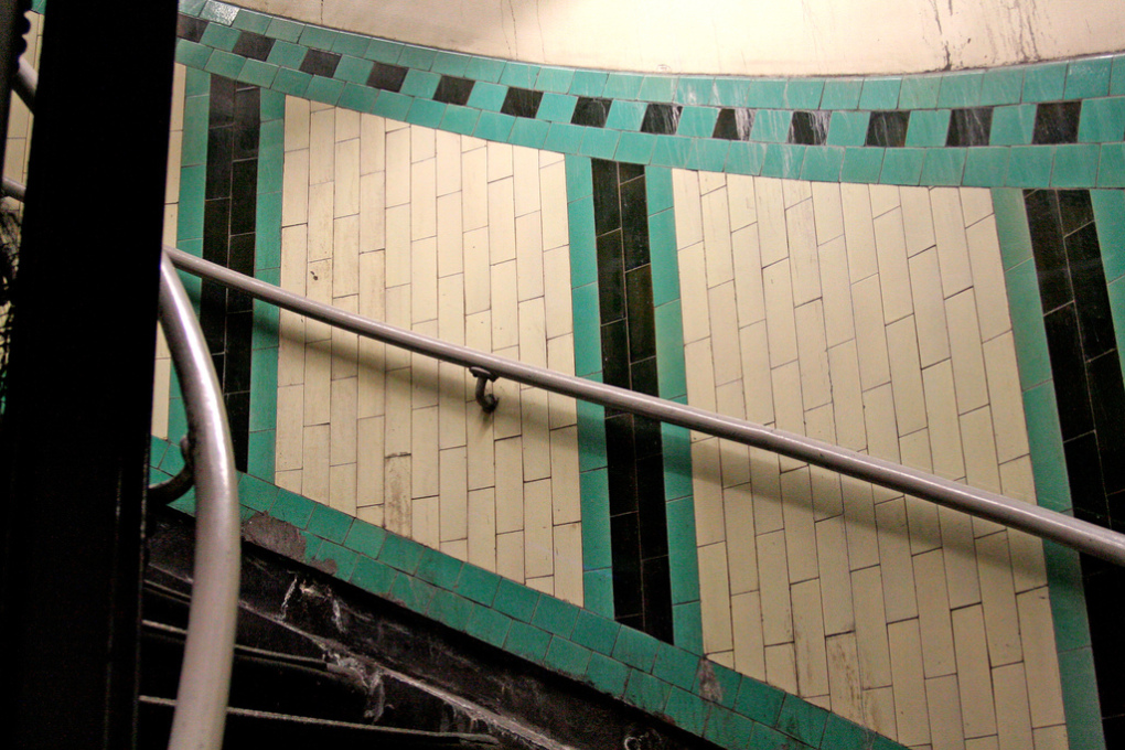 Russell Square Station's 175 step spiral-stair is still faced in the orignal decorative tile pattern from the end of the 19th century. (Photo: Nic McPhee)