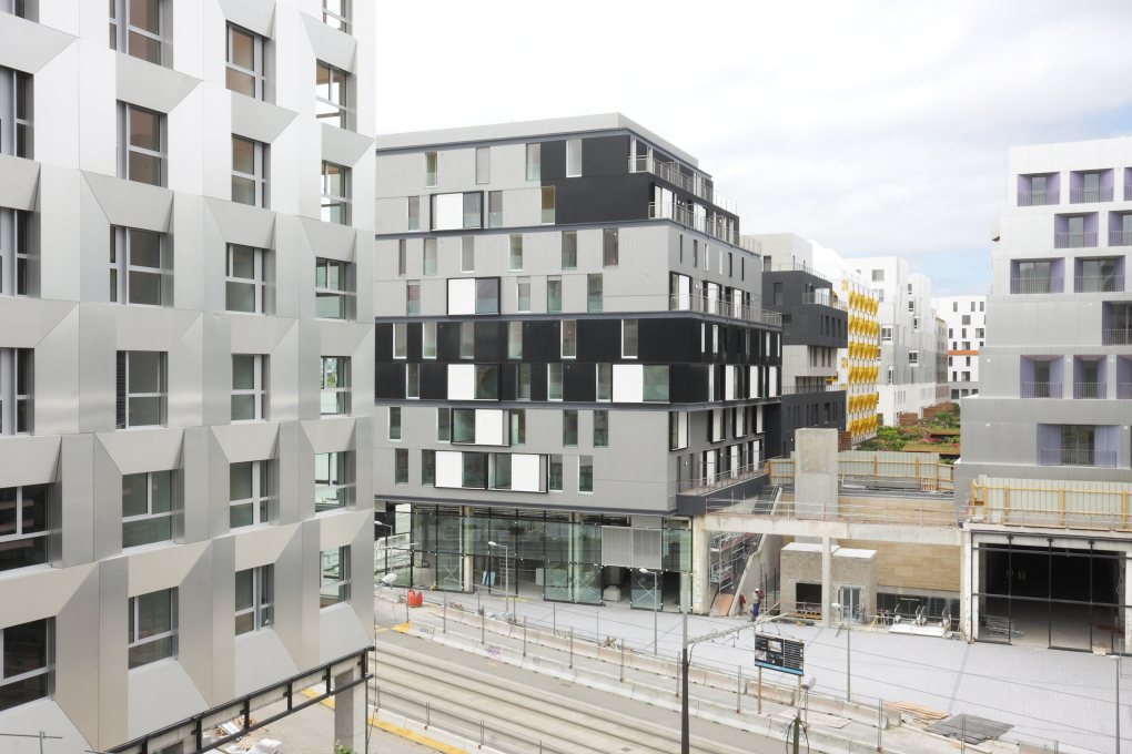 ...which is beside a corrugated clad block by Swedish architect Mia H&auml;g and her practice Habiter Autrement (centre). (Photo: Mattias Van Rossen, XDGA)