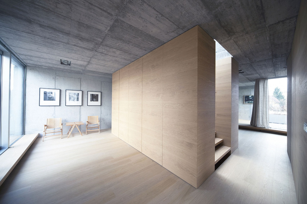 &ldquo;The materiality of the interior is raw and honest: while the ceiling and walls are concrete, the floors and furniture are all made of light oak.&rdquo;