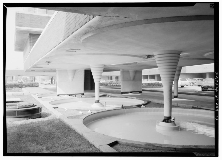 The columns of the complex car park rise from circles of water like frozen white whirlpools. (Courtesy of the Library of Congress)