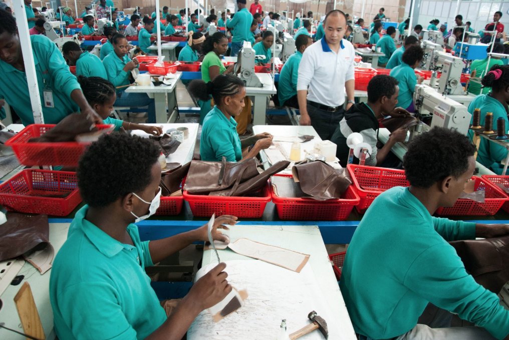 Ethiopian workers and Chinese management in the Huajian shoe factory in the Eastern Industry Zone near Addis Ababa, a Special Economic Zone modelled after China&rsquo;s southern city of Shenzhen. (Photo: Michiel Hulshof &amp; Daan Roggeveen)