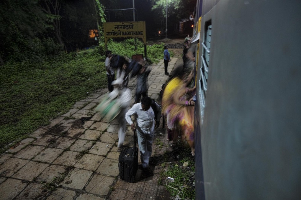 The Konkan railway can feel like a huge commuting system, with its two-minute stopovers at most stations, causing rushed scrambles in and out of trains.