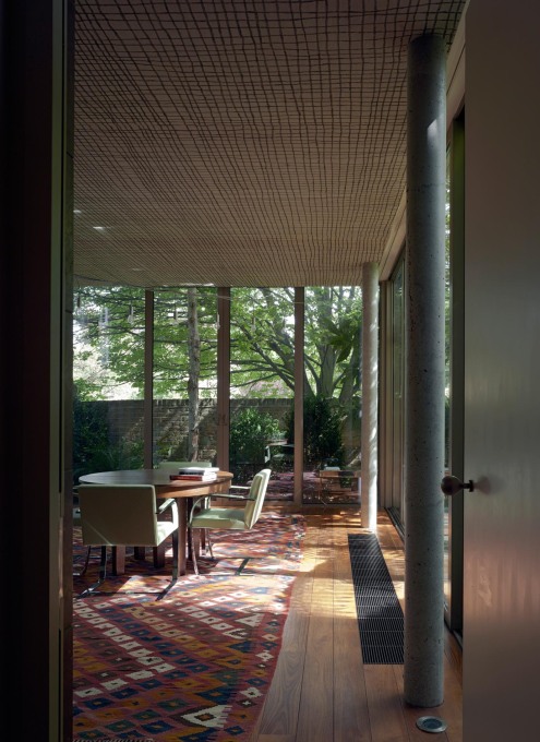 Red House, Chelsea, 2001. View through the dining room out to the walled garden, and the trees in the grounds of the Royal Hospital Chelsea beyond. (Photo: Peter Cook)