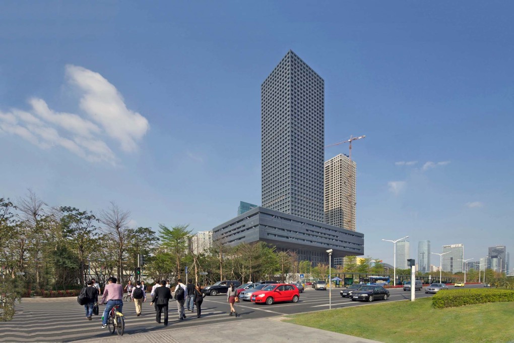 The building can be conceptualised as Lissitzky&rsquo;s egalitarian horizontal skyscraper creeping up Mies&rsquo;s shimmering corporate headquarters &ndash; symbolising capitalism in a communist country. (Photo:&nbsp;Philippe Ruault, courtesy OMA)