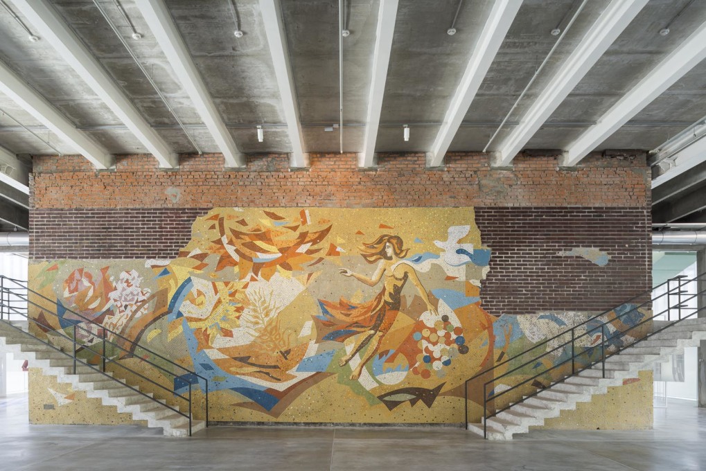 ...while what remains of a Soviet-era mural has been meticulously restored.&nbsp;